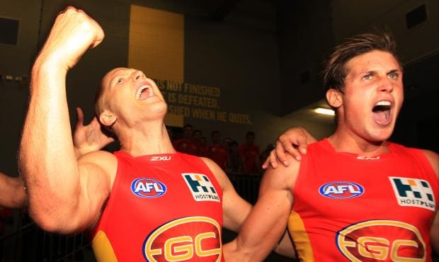 Gary Ablett and David Swallow belt out a rousing rendition of the Suns' song - ${keywords}